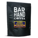 Two fifty gramme postal bag of Dawn Patrol, a seasonal blend - taste notes: bright, fruity, juicy. Roasted fresh to order from Bad Hand Coffee. Available as whole bean or ground to your brew method. These bags are 100% paper and home compostable. 