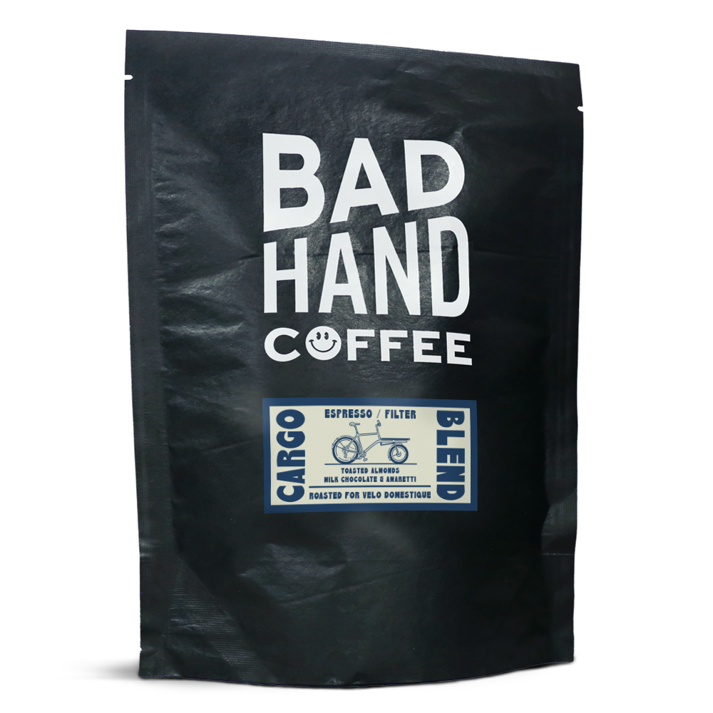 Two fifty gramme postal bag of Cargo blend - taste notes: toasted almonds, milk chocolate and amaretti. Roasted fresh to order from Bad Hand Coffee. Available as whole bean or ground to your home brew method. These bags are 100% paper and home compostable.