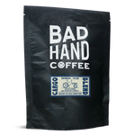 Two fifty gramme postal bag of Cargo blend - taste notes: toasted almonds, milk chocolate and amaretti. Roasted fresh to order from Bad Hand Coffee. Available as whole bean or ground to your home brew method. These bags are 100% paper and home compostable. 