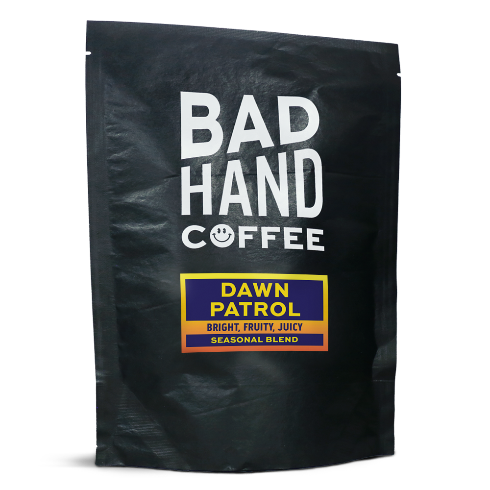 Two fifty gramme postal bag of Dawn Patrol seasonal blend - taste notes: Bright, Fruity, Juicy. Roasted fresh to order from Bad Hand Coffee. Available as whole bean or ground to your home brew method. These bags are 100% paper and home compostable. 