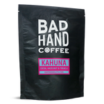 Two fifty gramme postal bag of Kahuna, a blend of coffees from Brazil with taste notes of cocoa, hazelnut and treacle, roasted fresh to order from Bad Hand Coffee. Available as whole bean or ground to your brew method. These bags are 100% paper and home compostable. 