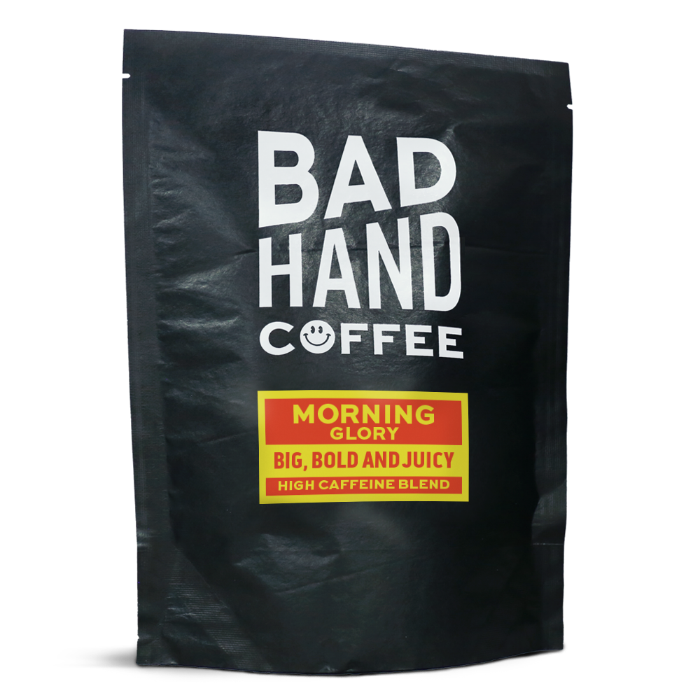 Two fifty gramme postal bag of Morning Glory high caffeine blend - taste notes: big, bold and juicy. Roasted fresh to order from Bad Hand Coffee. Available as whole bean or ground to your home brew method. These bags are 100% paper and home compostable. 