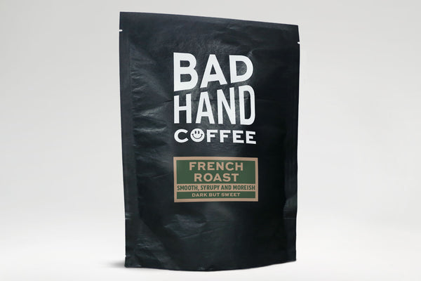 Bad Hand Coffee - Two fifty gramme postal bag of French Roast - taste notes: smooth, syrupy and moreish. Hand roasted dark and fresh to order. Available as whole bean or ground to your home brew method. These bags are 100% paper and home compostable.