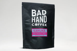 Buying our coffee is easy, order two fifty gramme postal bag or 1kg bags of Bad Hand Coffee Kahuna espresso/filter blend. A blend of coffees from Brazil with taste notes of cocoa, hazelnut and treacle, hand roasted and fresh to order. Available as whole bean or ground to your brew method. These bags are 100% paper and home compostable.