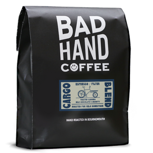 One kilogram bag of Cargo blend - taste notes: toasted almonds, milk chocolate and amaretti. Roasted fresh to order from Bad Hand Coffee. Available as whole bean or ground to your home brew method.
