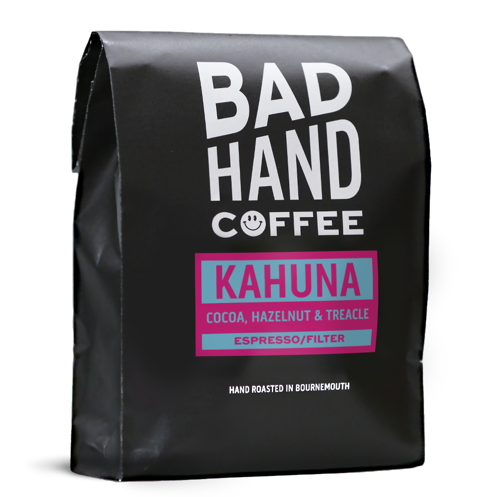 One kilogram bag of Kahuna, a blend of coffees from Brazil with taste notes of cocoa, hazelnut and treacle, roasted fresh to order from Bad Hand Coffee. Available as whole bean or ground to your brew method.
