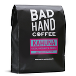 One kilogram bag of Kahuna, a blend of coffees from Brazil with taste notes of cocoa, hazelnut and treacle, roasted fresh to order from Bad Hand Coffee. Available as whole bean or ground to your brew method.